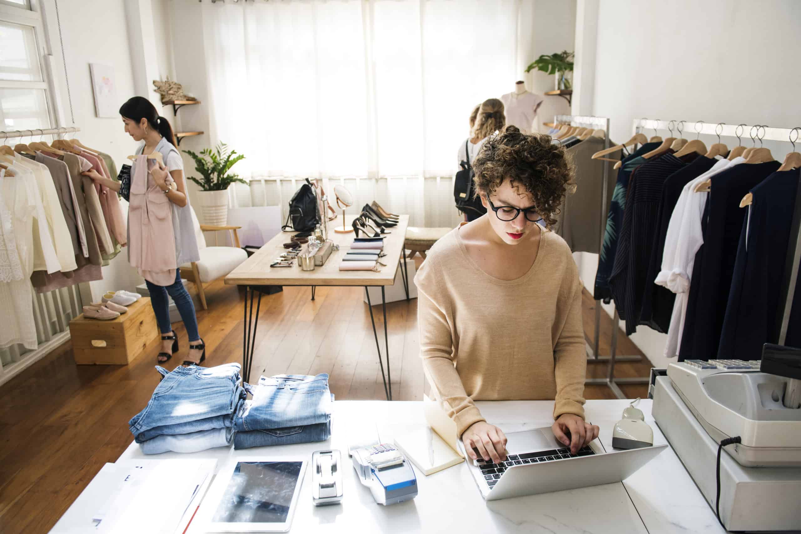 Small business owner managing invoices online
