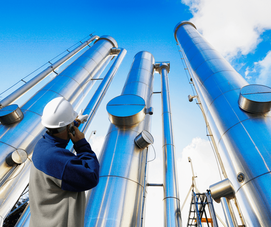 Oil and gas worker on a call at a gas processing facility