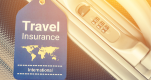 Travel Insurance International tag on Suitcase