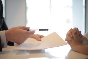working capital loan no credit check; people signing documents