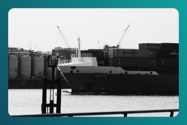 cargo ships in black and white